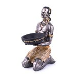 African man with candle holder